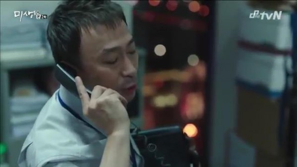 A person in a business setting making a phone call.